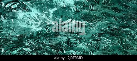 Immagine di sfondo con un motivo astratto in toni verdi Foto Stock