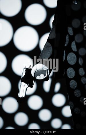 Pistola a pistola scura di notte Foto Stock