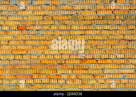 Muro di mattoni gialli. Interno di un loft moderno. Sfondo per la registrazione di interviste e progetti. Foto Stock