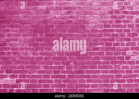 Muro di mattoni rosa. Interno di un loft moderno. Sfondo per le riprese di foto e video. La facciata di un edificio in mattoni. Foto Stock
