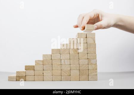 Concetto di business con blocchi di legno Foto Stock