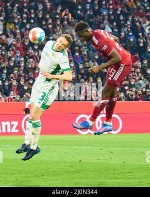 Tanguy Nianzou, FCB 23 punteggi, spara gol , Tor, Treffer, Torschuss, 1-0, Paul Jaeckel, Union Berlin 3 nella partita FC BAYERN München - 1.FC UNION BERLIN 4-0 1.German Football League il 19 marzo 2022 a Monaco di Baviera, Germania. Stagione 2021/2022, giorno di festa 27, 1.Bundesliga, FCB, München, 27.Spieltag. FCB, © Peter Schatz / Alamy Live News - LE NORMATIVE DFL VIETANO L'USO DI FOTOGRAFIE come SEQUENZE DI IMMAGINI e/o QUASI-VIDEO - Foto Stock