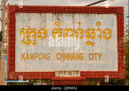 Weathered bilingual 'Kampong Chhnang City' sign, Kampong Chhnang, Cambodia. credit: Kraig Lieb Stock Photo