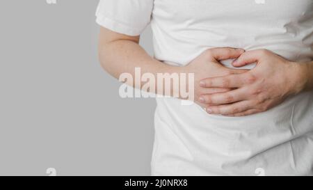 Paziente affetto da stomachache . Alta qualità e risoluzione bellissimo concetto di foto Foto Stock