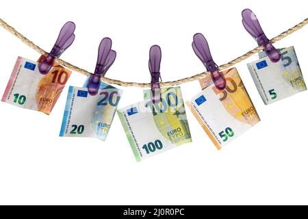 Le banconote in euro su stendibiancheria Foto Stock