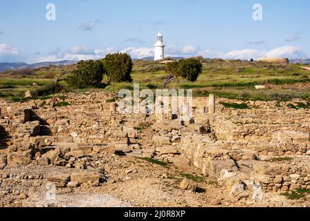 Faro di Paphos situato all'interno del Parco Archeologico di Paphos, Cipro, un sito patrimonio mondiale dell'UNESCO. Foto Stock