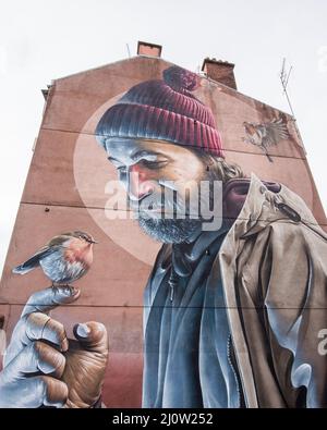 Murales dipinti sulle pareti si trovano sul Glasgow Mural Art Trail. Alcuni sono stati commissionati appositamente, come questo da 'Mug' Foto Stock