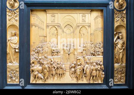 Florence Gate of Paradise: main old door of the Baptistry of Florence - Battistero di San Giovanni - located in front of the Cat Stock Photo