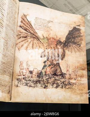 Foglio manoscritto antico. Libro gotico con illustrazione satanica dell'inferno. Foto Stock