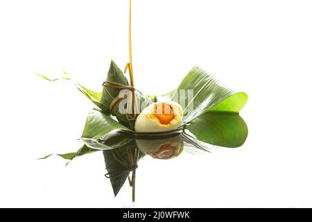 Fotografia creativa, Zongzi (gnocchi di riso) e uovo d'anatra salato Foto Stock