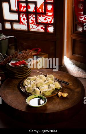 Cucina cinese, boiled jiaozi, gnocchi cinesi Foto Stock