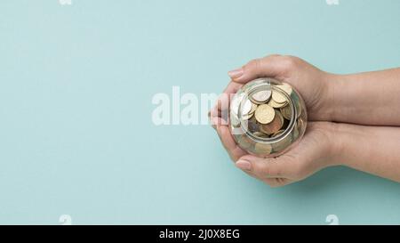 Vasetto in vetro Coins con spazio per la copia. Concetto di foto di alta qualità Foto Stock