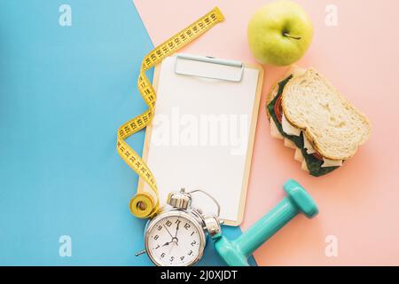 Perdita di peso composizione con cibo sano. Concetto di foto di alta qualità Foto Stock