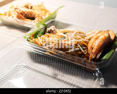 Pad thua cibo scatola consegna, lavoro da casa situazione Foto Stock