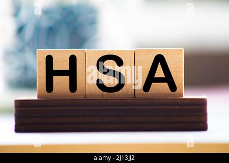 Conto di risparmio di salute HSA lettere da blocchi di legno Foto Stock