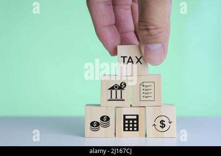 cubo di legno icona blocco FISCALE concetto di business. Foto Stock