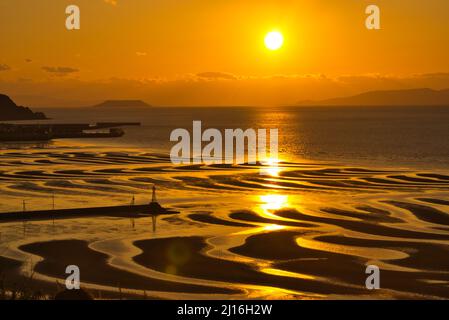 Okoshiki spiaggia di tramonto, Prefettura di Kumamoto, Giappone Foto Stock