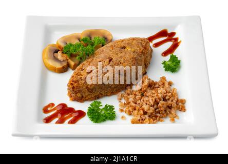 Cotoletta appena sfornata fatta in casa isolata su sfondo bianco. Foto Stock