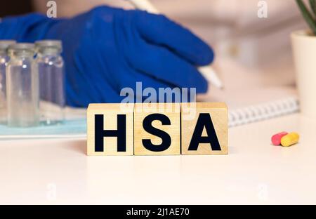 Conto di risparmio di salute HSA lettere da blocchi di legno Foto Stock