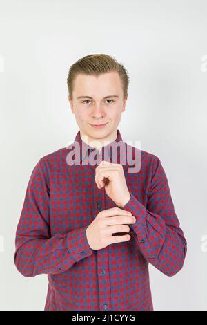 Ritratto di carino sedicenne ragazzo in studio Foto Stock