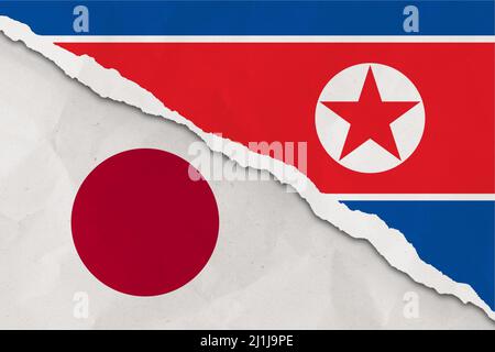 Giappone e Corea del Nord bandiera strappato carta grunge sfondo. Astratto Giappone e Corea del Nord economia, conflitti politici, concetto di guerra trama backgroun Foto Stock