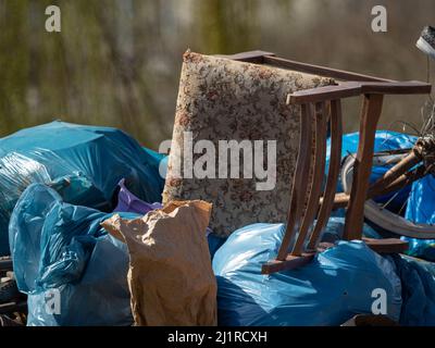 Spazzatura raccolta in jena mentre saaleputz con un sacco di persone onorarie Foto Stock