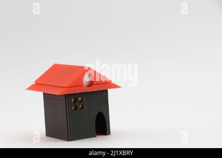 3D casa modello stampata realizzata con tecnologia di stampa 3D, concetto di avanzamento nella tecnologia edile Foto Stock