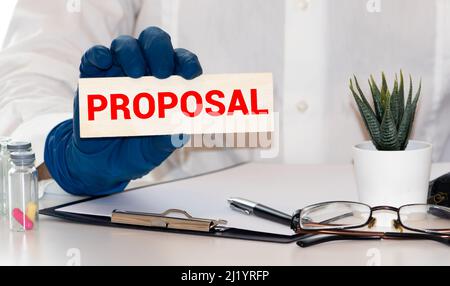 PAROLA DI PROPOSTA su carta di indice della scheda, concetto medico Foto Stock