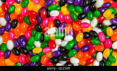 Colorati fagioli di gelatina caramelle sfondo da vicino Foto Stock