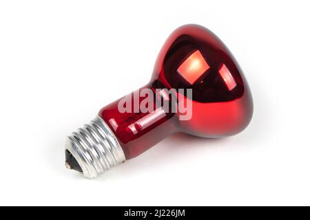 Lampada rossa dell'incubatore isolata su sfondo bianco. Foto Stock