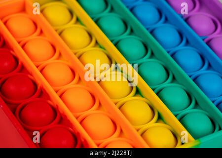colorato antistress sensoriale fidget giocattolo spingere pop it. Foto Stock