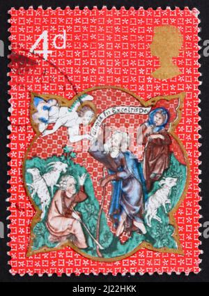 GRAN BRETAGNA - CIRCA 1970: Un francobollo stampato in Gran Bretagna mostra Angel che appare davanti ai pastori, da de Lisle Salterio, Natale, circa 1 Foto Stock