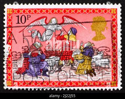 GRAN BRETAGNA - CIRCA 1979: Un francobollo stampato in Gran Bretagna mostra Angel che appare prima dei pastori, Natale, circa 1979 Foto Stock