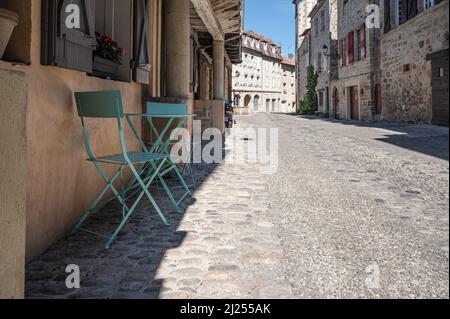 Strada acciottolata nel cité, la città vecchia di Beaulieu-sur-Dordogne, Francia Foto Stock