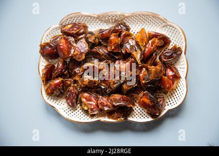 date in una ciotola per eid mubarak Foto Stock