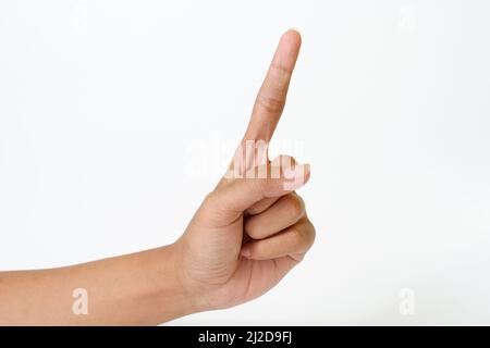 Una mano femmina caucasica per adulti che mostra un dito come un segno di avvertimento isolato su uno sfondo bianco Foto Stock
