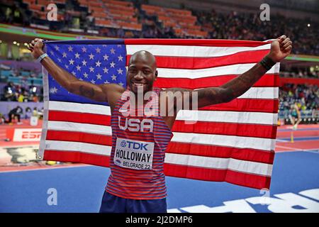 Grant Holloway (USA) si pone con la bandiera degli Stati Uniti dopo aver vinto i 60m ostacoli nel 7,39 durante il World Athletics Indoor Championships, Sunday Mar. Foto Stock