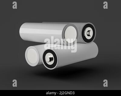 Un rendering 3D di batterie AA su sfondo grigio Foto Stock