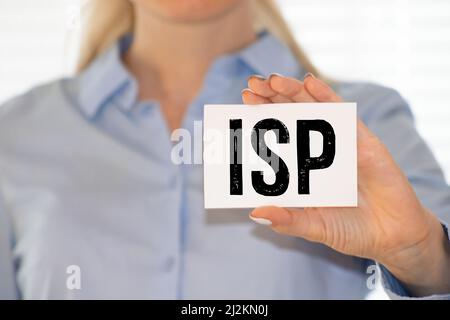 ISP- Internet Service Provider scritto in notebook su sfondo di legno Foto Stock