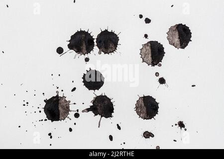 Lobi neri disegnati a mano, macchie, macchie di vernice. Sfondo astratto Foto Stock