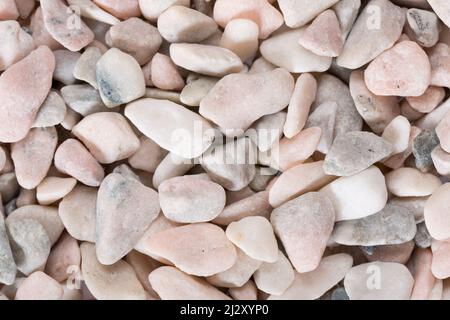 Schema neutro di pietre pallidi. Disposizione piatta, vista dall'alto. Foto Stock