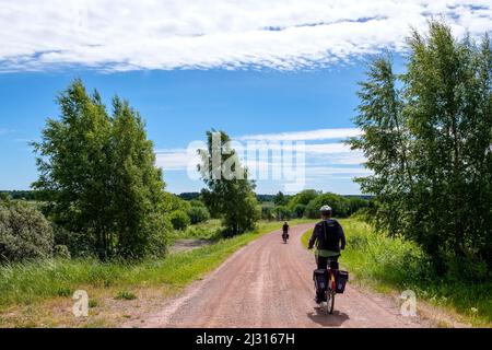 In bicicletta sull'isola di Ahland, Ahland, Finlandia Foto Stock