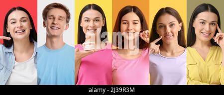 Molte persone felici con bretelle dentarie su sfondo colorato Foto Stock