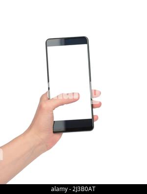 Una mano della donna tiene un telefono con uno schermo bianco su uno sfondo bianco, isolare. Display dello smartphone vuoto con spazio per il testo Foto Stock
