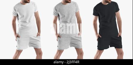 Set di magliette e pantaloncini sportivi da uomo con shorts a compressione. Abbigliamento sportivo bianco, nero e grigio erica. Modello per la presentazione Foto Stock