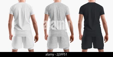 Set di magliette e pantaloncini sportivi da uomo con shorts a compressione. Abbigliamento sportivo bianco, nero e grigio erica. Vista posteriore Foto Stock