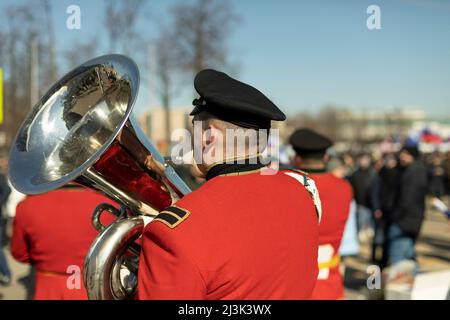 Trombettista della banda militare. Strumento del vento. Performance musicale. Parata militare. Foto Stock