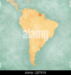 Suriname (bandiera Surinamese) sulla mappa del Sud America. La mappa è in stile estivo d'epoca e d'atmosfera soleggiata. La mappa ha un soft grunge e atmos vintage Foto Stock