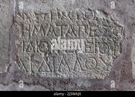 Scrittura antica, geroglifo sul muro nella Chiesa di San Nicola a Demre in Turchia. Foto Stock