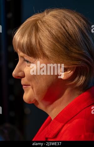 Angela Merkel figura ritratto laterale della cera, ex cancelliere tedesco nel museo delle cere di Madame Tussauds a Berlino, Germania. Foto Stock